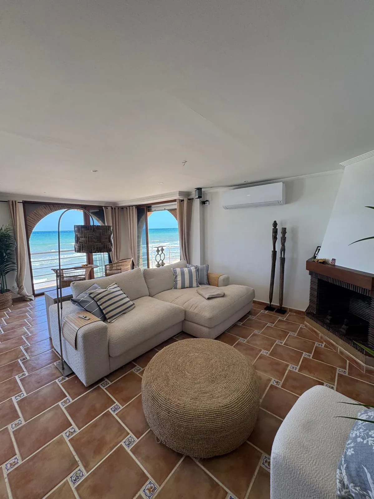 Living room with sofas and beach views